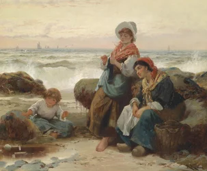 Pescatrici con bambino sulla costa